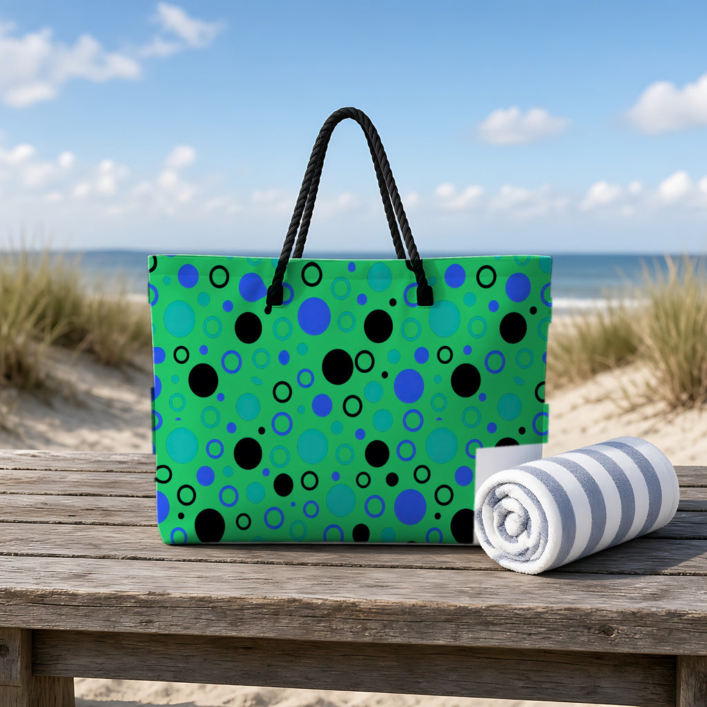 Bubble Outlines Weekender Tote Bag on a rustic table by the beach
