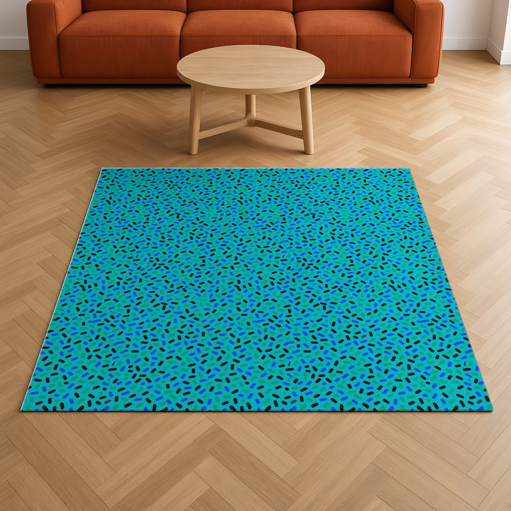 Sprinkle Pop Outdoor Rug on a herringbone wood floor in a living room