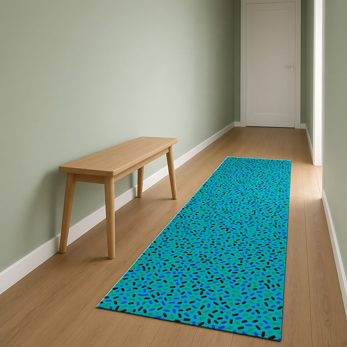 Sprinkle Pop Outdoor Rug as a runner in a sage-green hallway
