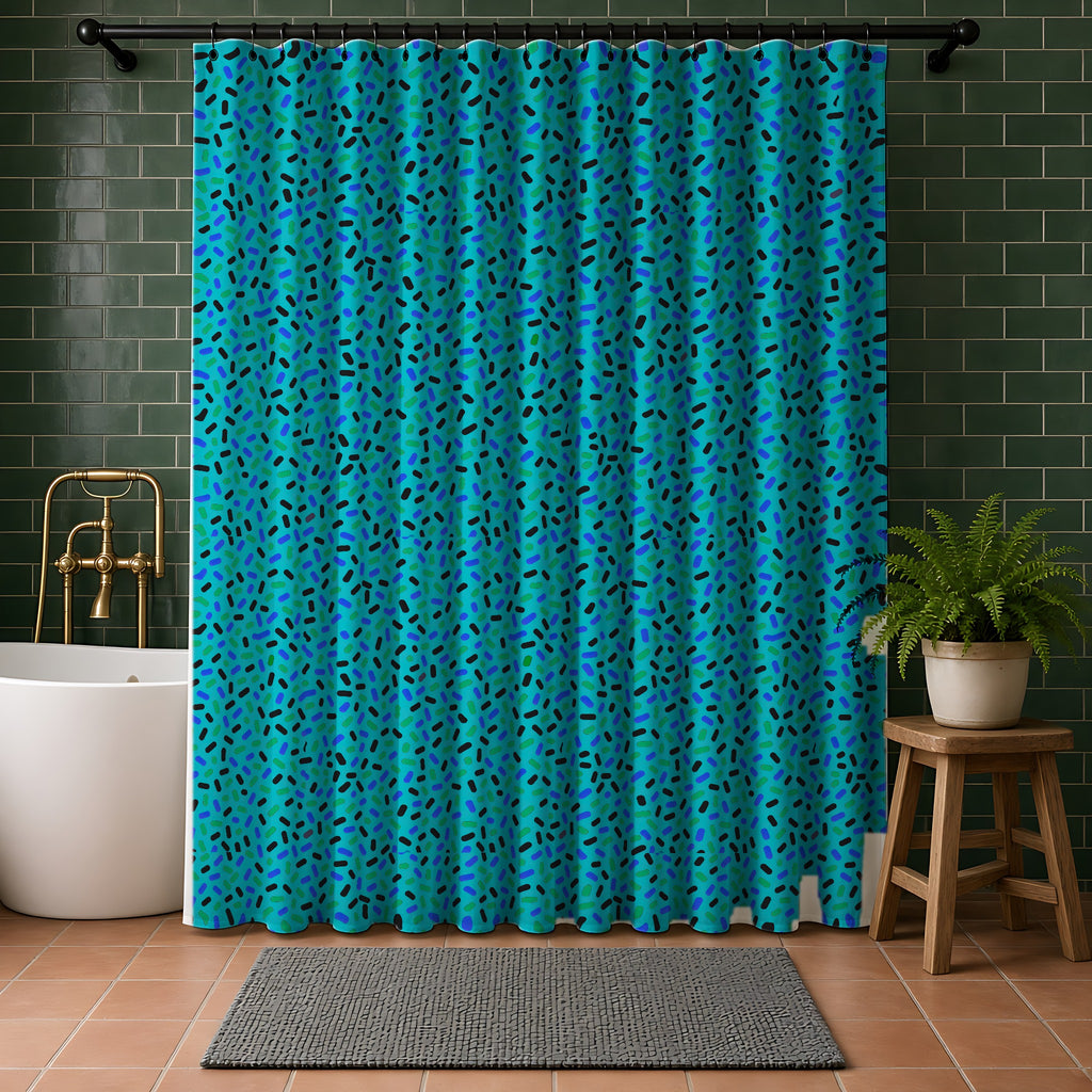 Sprinkle Pop Shower Curtain in a bathroom with dark green tiles