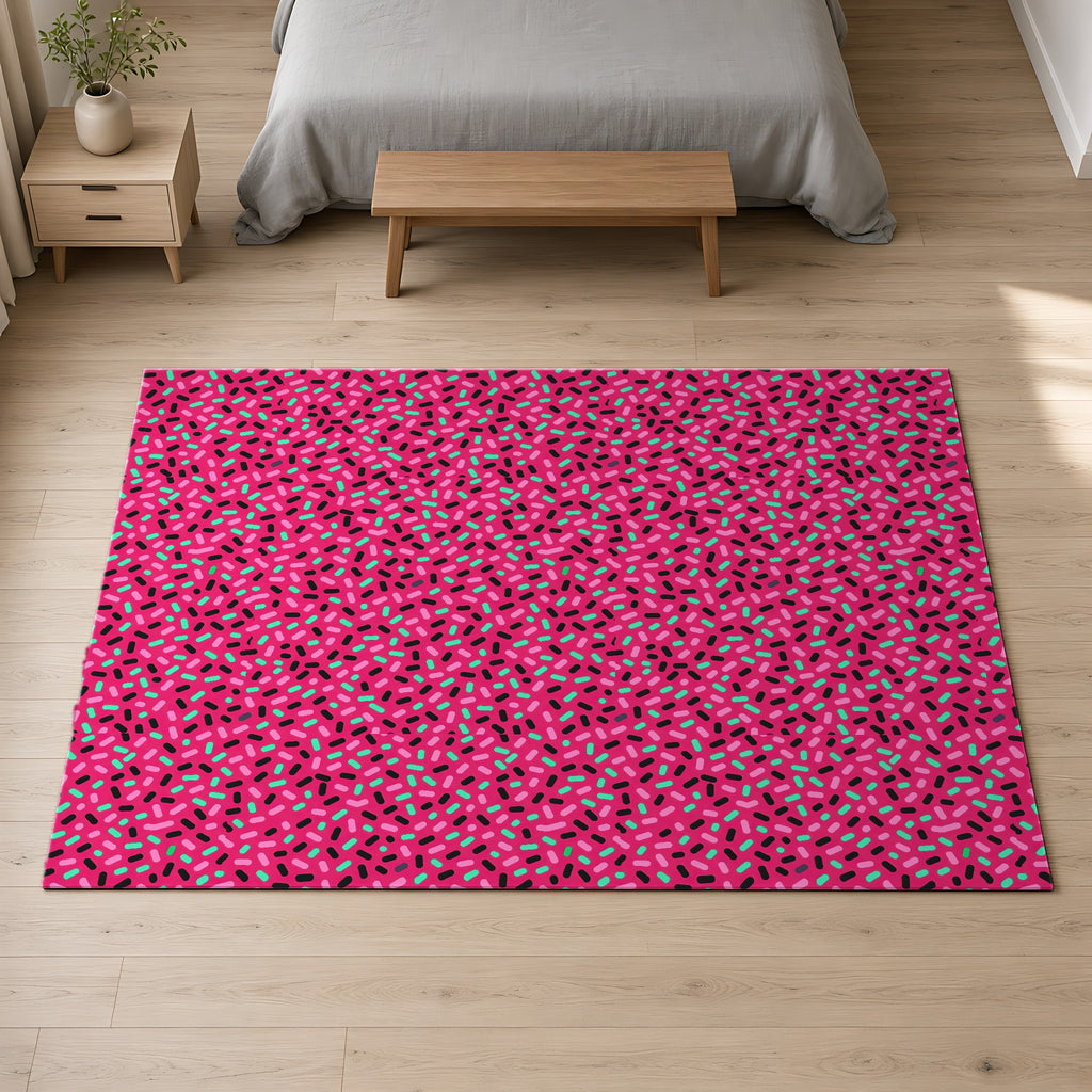 Sprinkle Pop Outdoor Rug on a pale oak floor in a calm bedroom