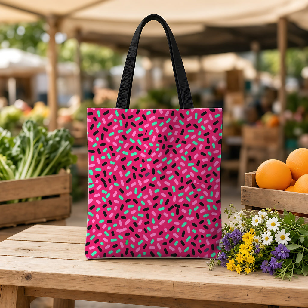 Sprinkle Pop Weekender Tote Bag on a wooden bench at a farmers market