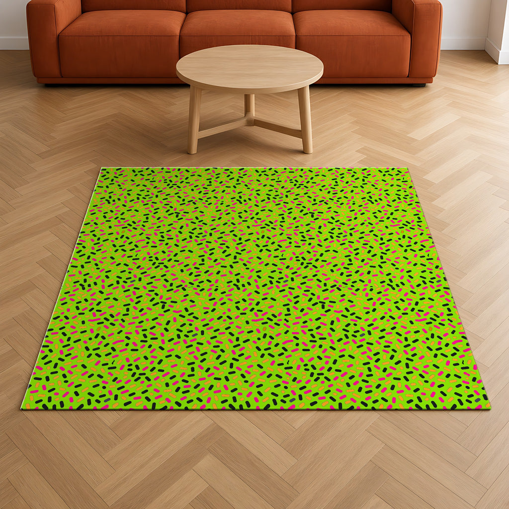 Sprinkle Pop Outdoor Rug on a herringbone wood floor in a living room