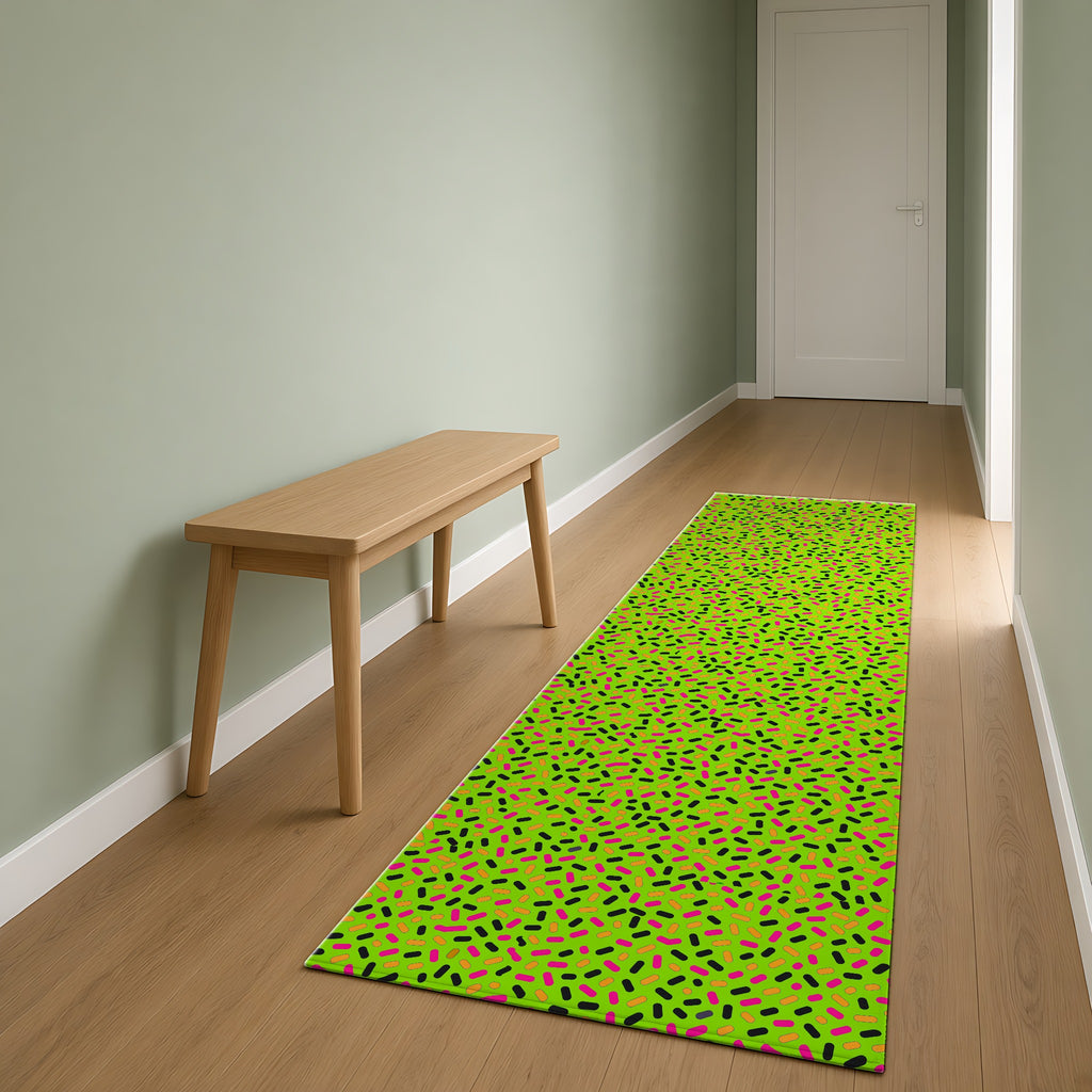 Sprinkle Pop Outdoor Rug as a runner in a sage-green hallway