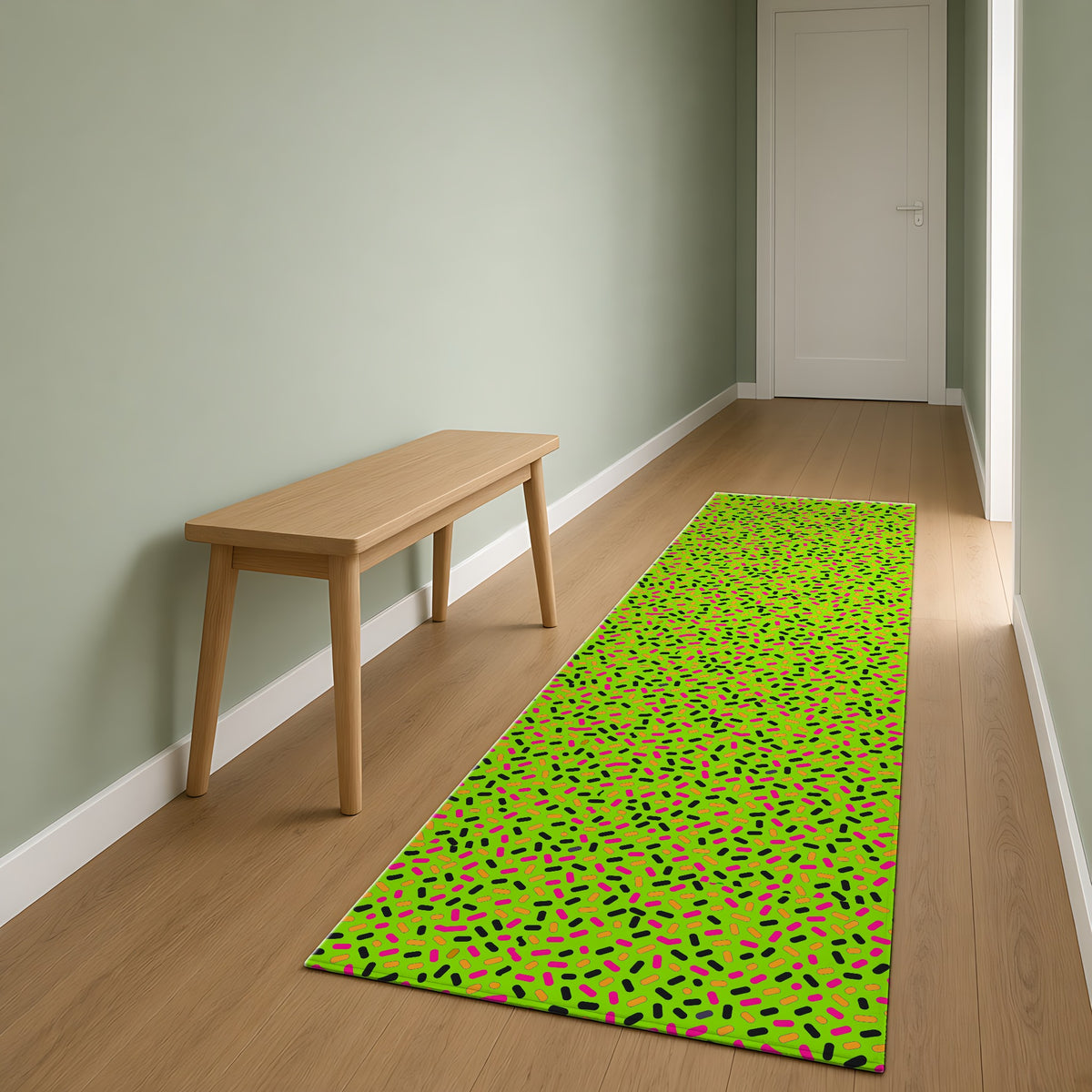 Sprinkle Pop Outdoor Rug as a runner in a sage-green hallway