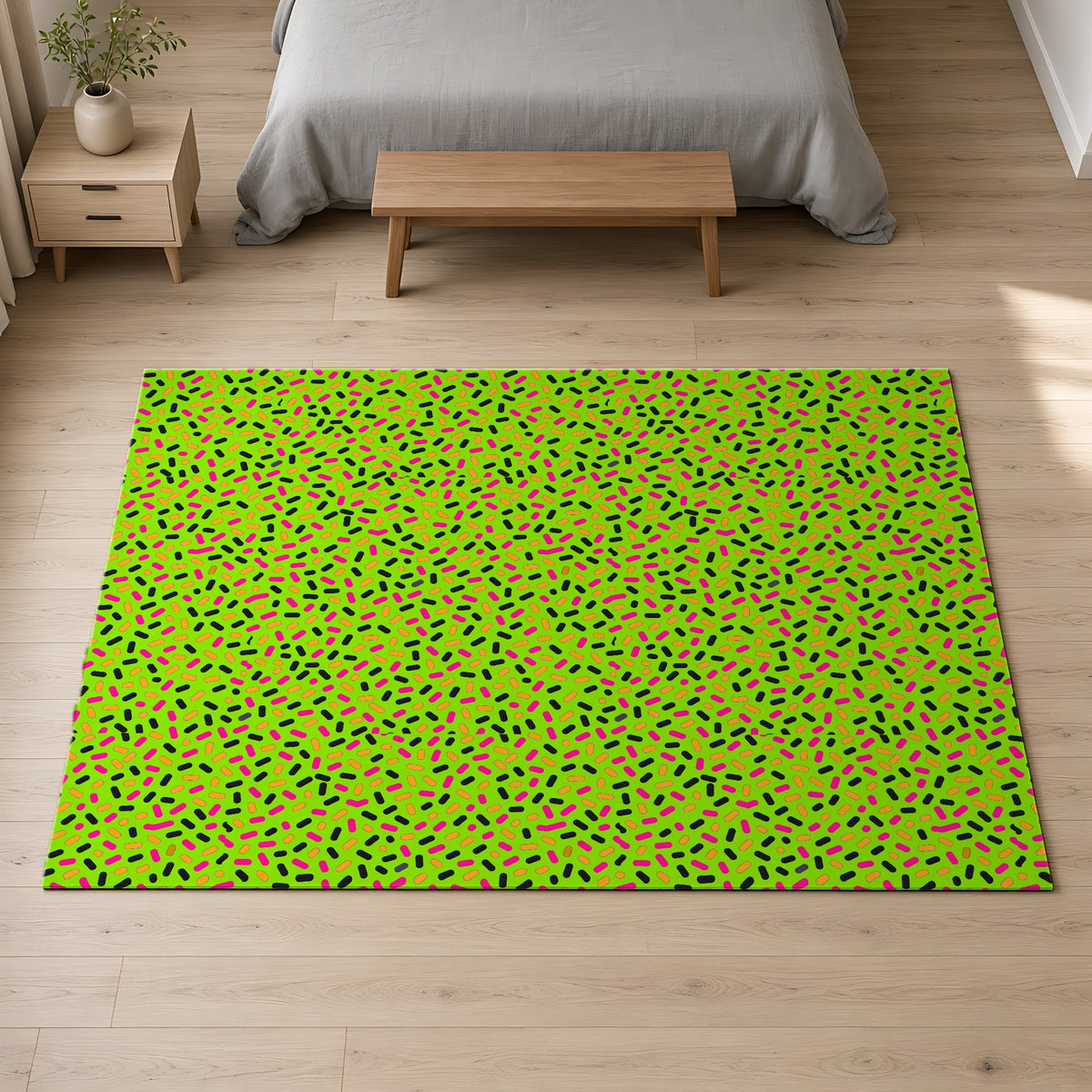 Sprinkle Pop Outdoor Rug on a pale oak floor in a calm bedroom
