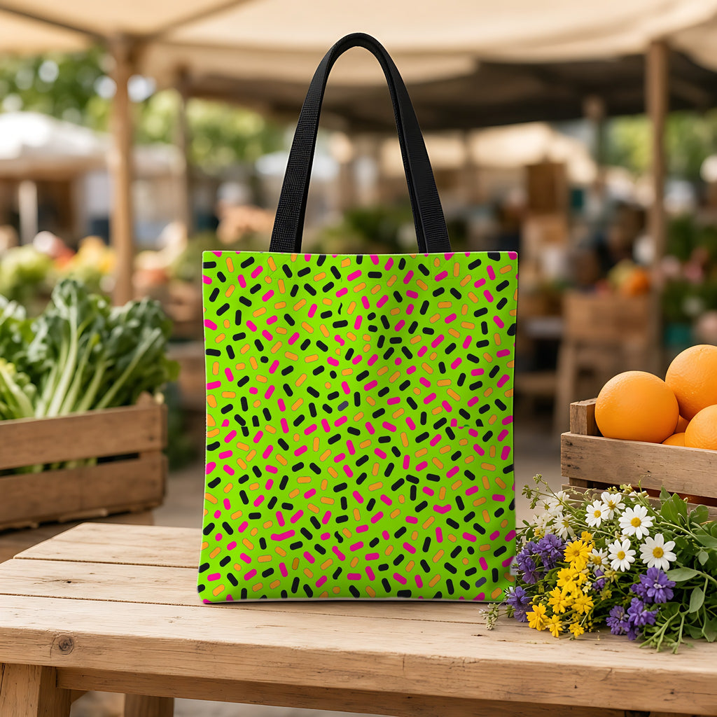 Sprinkle Pop Weekender Tote Bag on a wooden bench at a farmers market
