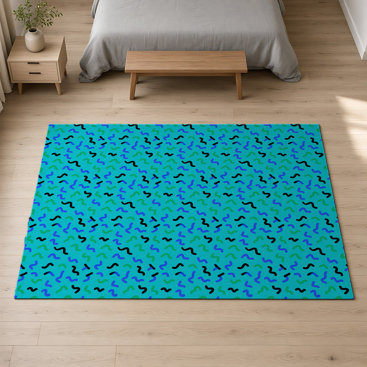 Squiggle Strokes Outdoor Rug on a pale oak floor in a calm bedroom