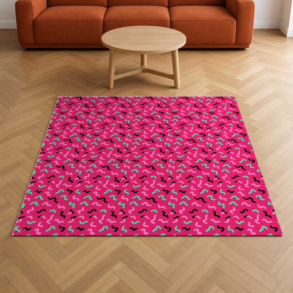 Squiggle Strokes Outdoor Rug on a herringbone wood floor in a living room