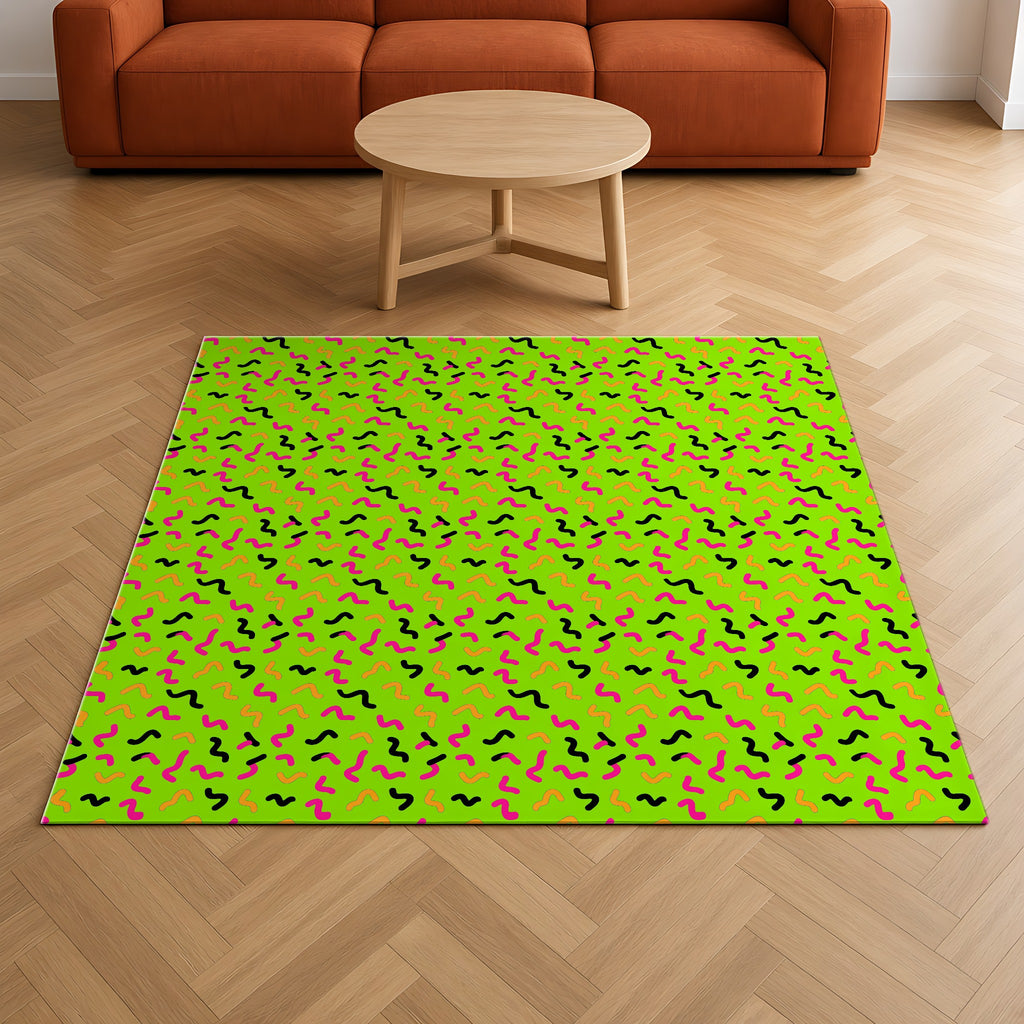 Squiggle Strokes Outdoor Rug on a herringbone wood floor in a living room