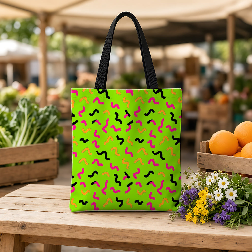 Squiggle Strokes Weekender Tote Bag on a wooden bench at a farmers market