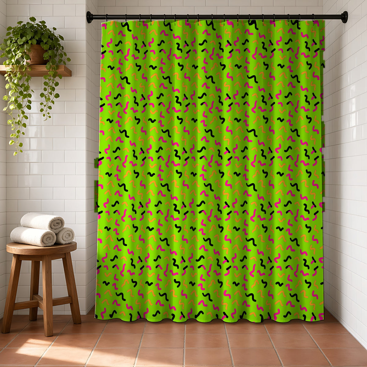 Squiggle Strokes Shower Curtain in a bright bathroom with white tiles and a terracotta floor