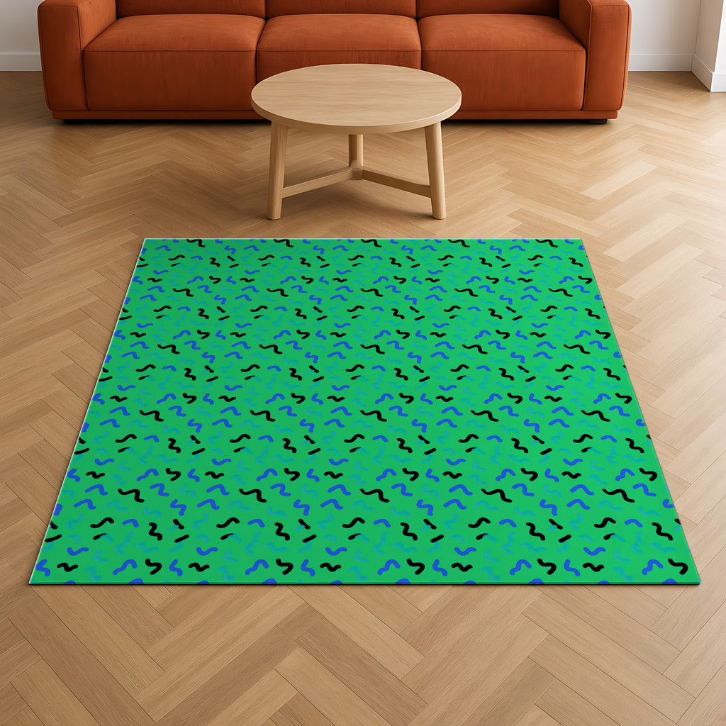 Squiggle Strokes Outdoor Rug on a herringbone wood floor in a living room