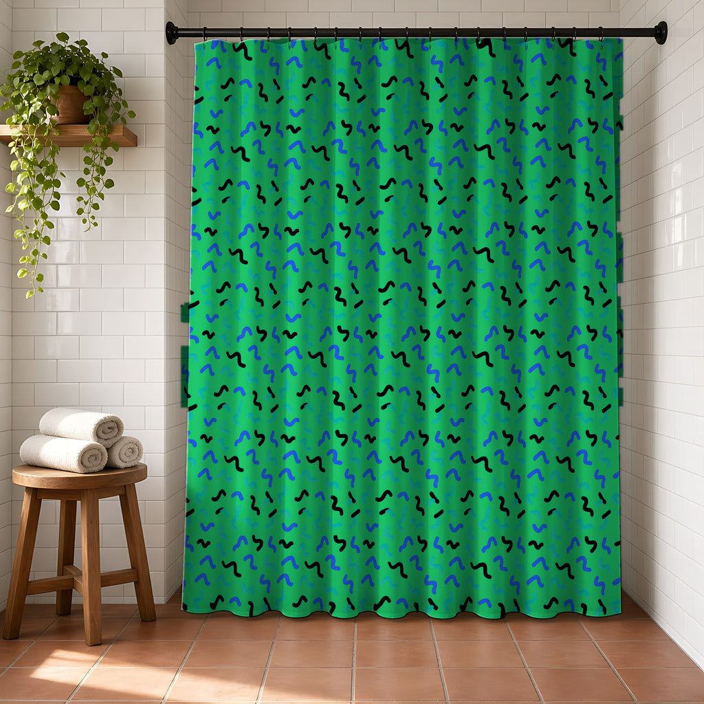 Squiggle Strokes Shower Curtain in a bright bathroom with white tiles and a terracotta floor