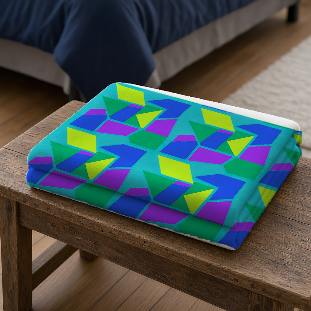 Cubist Block Quilt Sherpa Fleece Blanket folded on a wooden bench