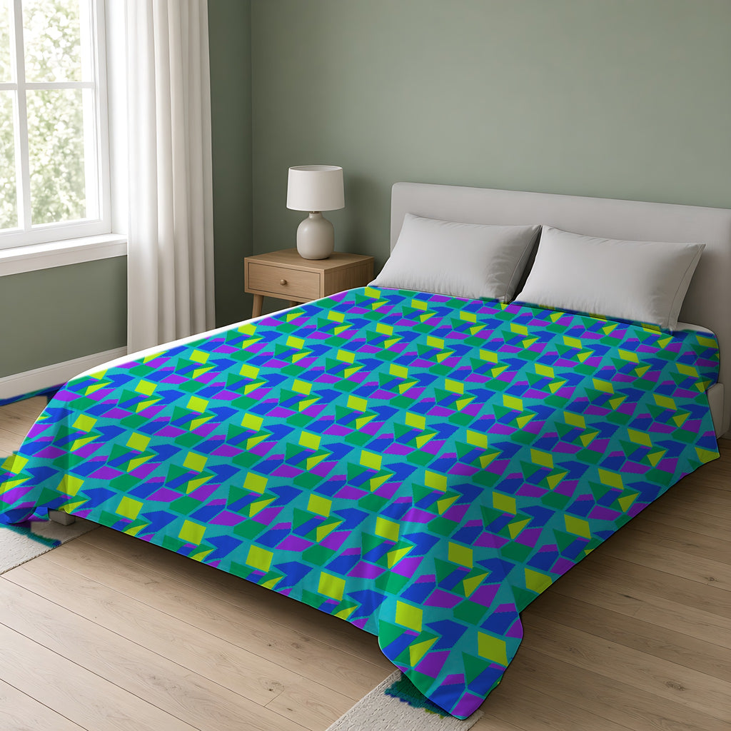 Cubist Block Quilt Comforter on a double bed in a bright sage-green bedroom