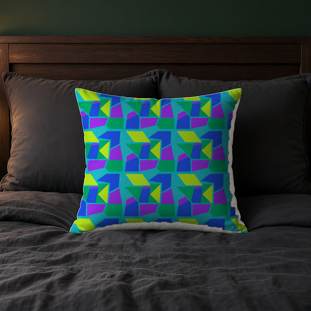 Cubist Block Quilt Faux Suede Cushion on a bed with charcoal bedding
