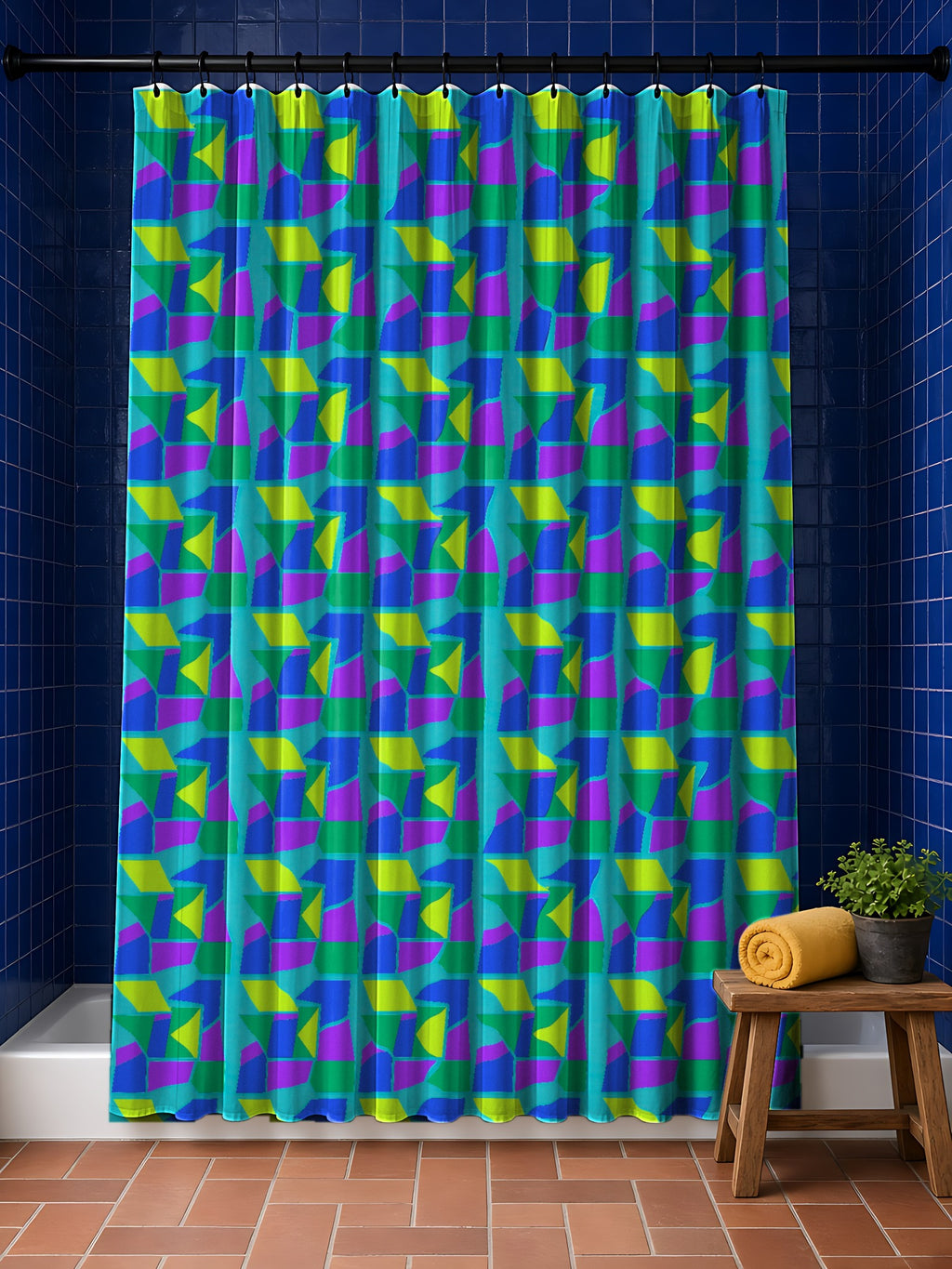 Cubist Block Quilt Shower Curtain in the Peacock Jewel palette, hanging in a bathroom with cobalt tiles and a terracotta floor