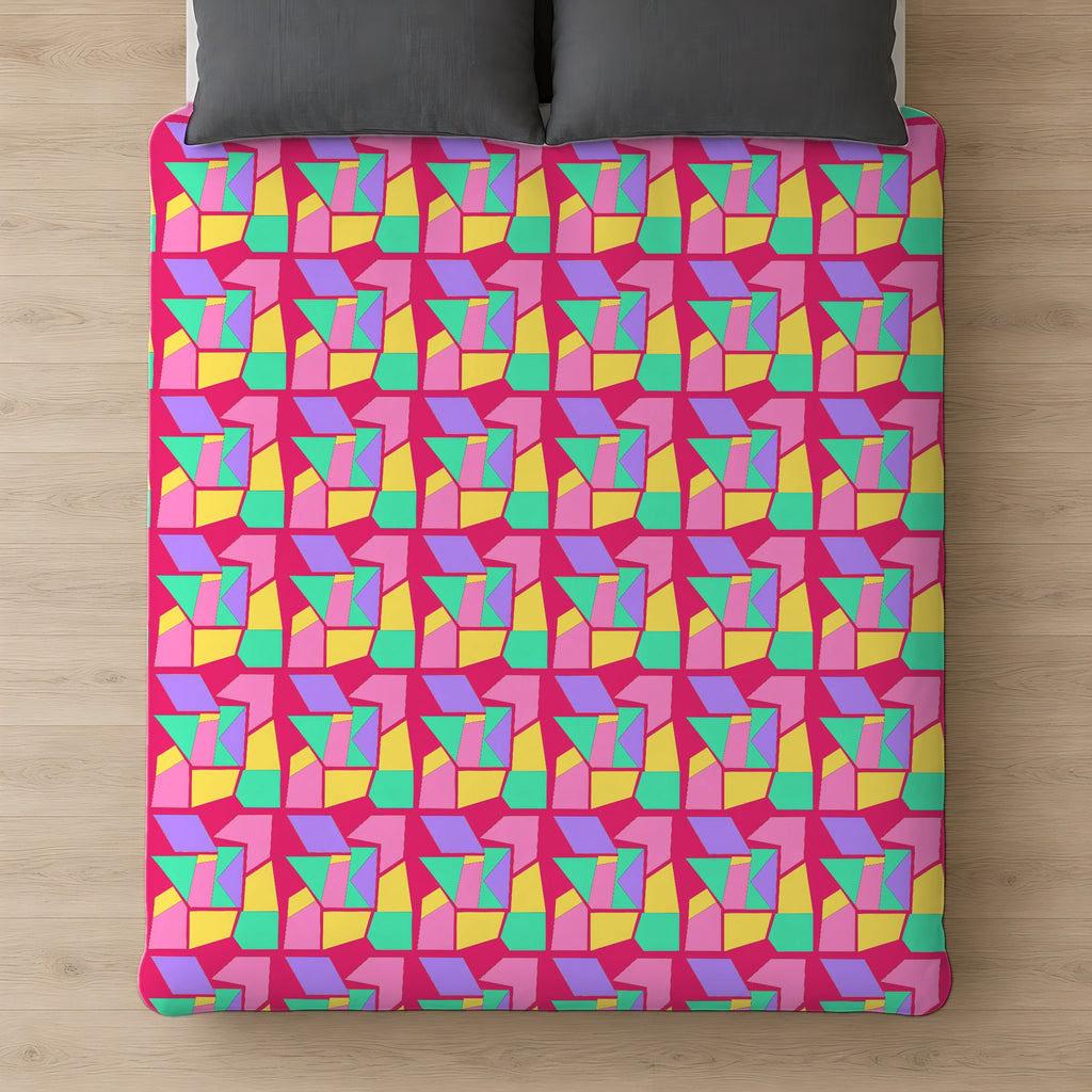 Cubist Block Quilt Comforter on a bed, seen from above