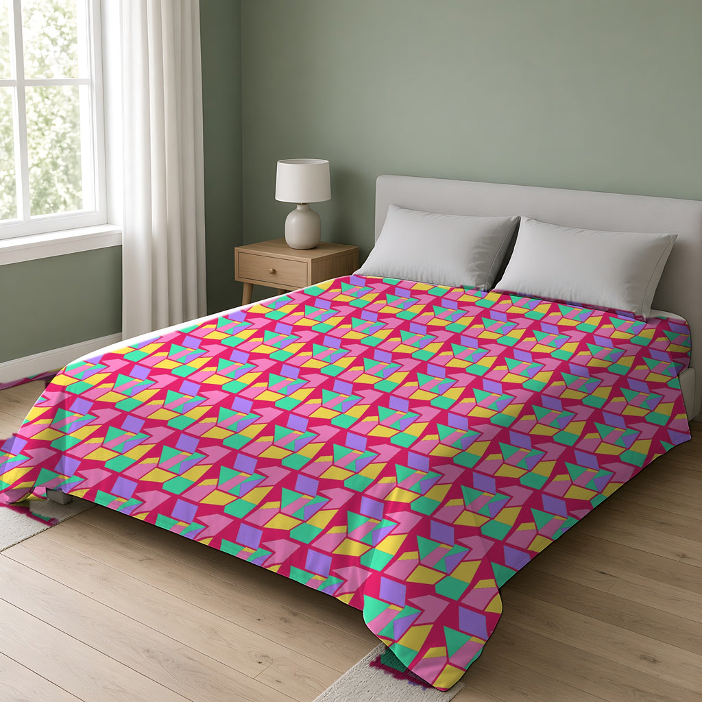Cubist Block Quilt Cotton Duvet Cover on a double bed in a bright sage-green bedroom