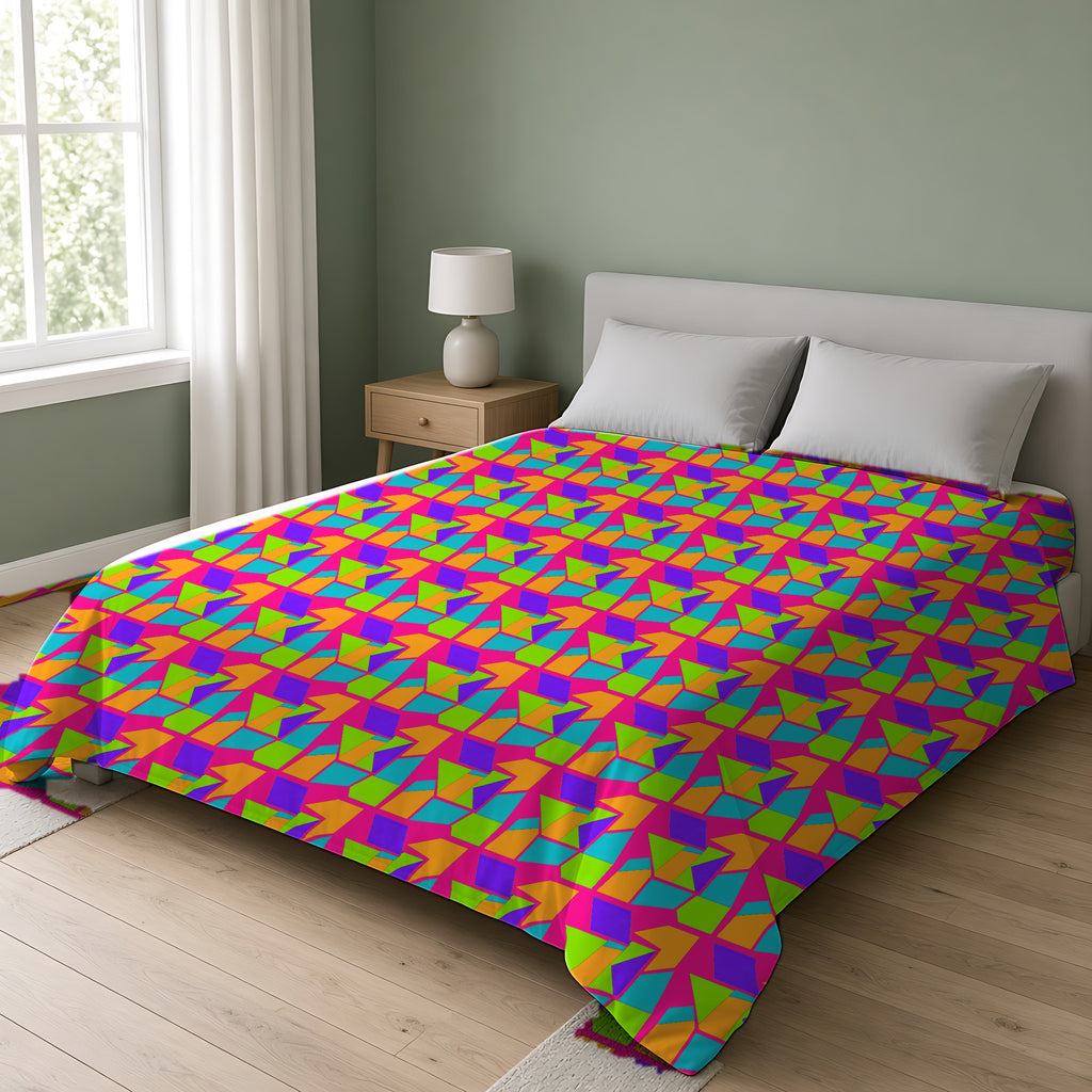 Cubist Block Quilt Cotton Duvet Cover on a double bed in a bright sage-green bedroom