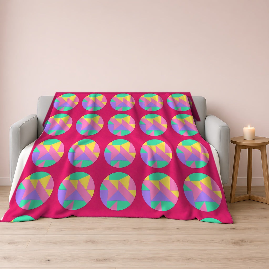 Broken Circle Planes Sherpa Fleece Blanket draped over a grey sofa