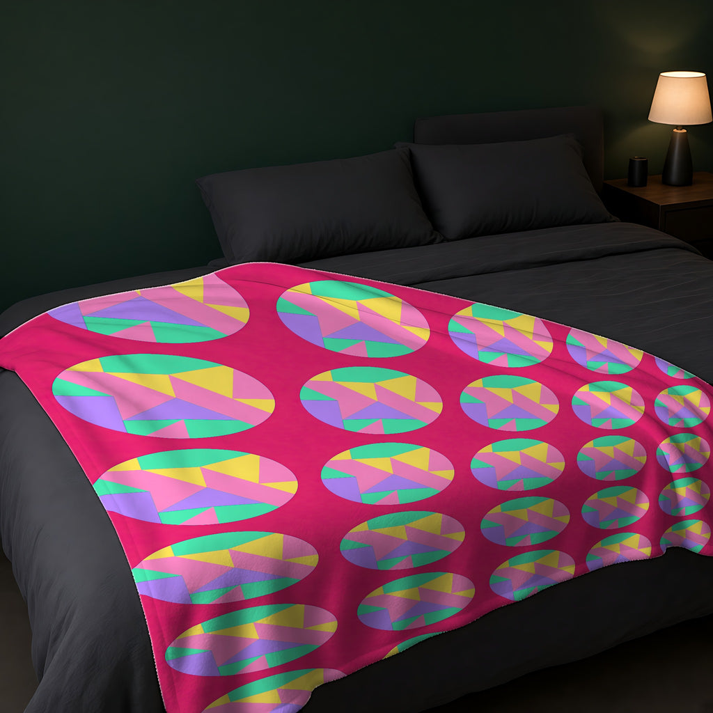 Broken Circle Planes Sherpa Fleece Blanket across the foot of a dark bed