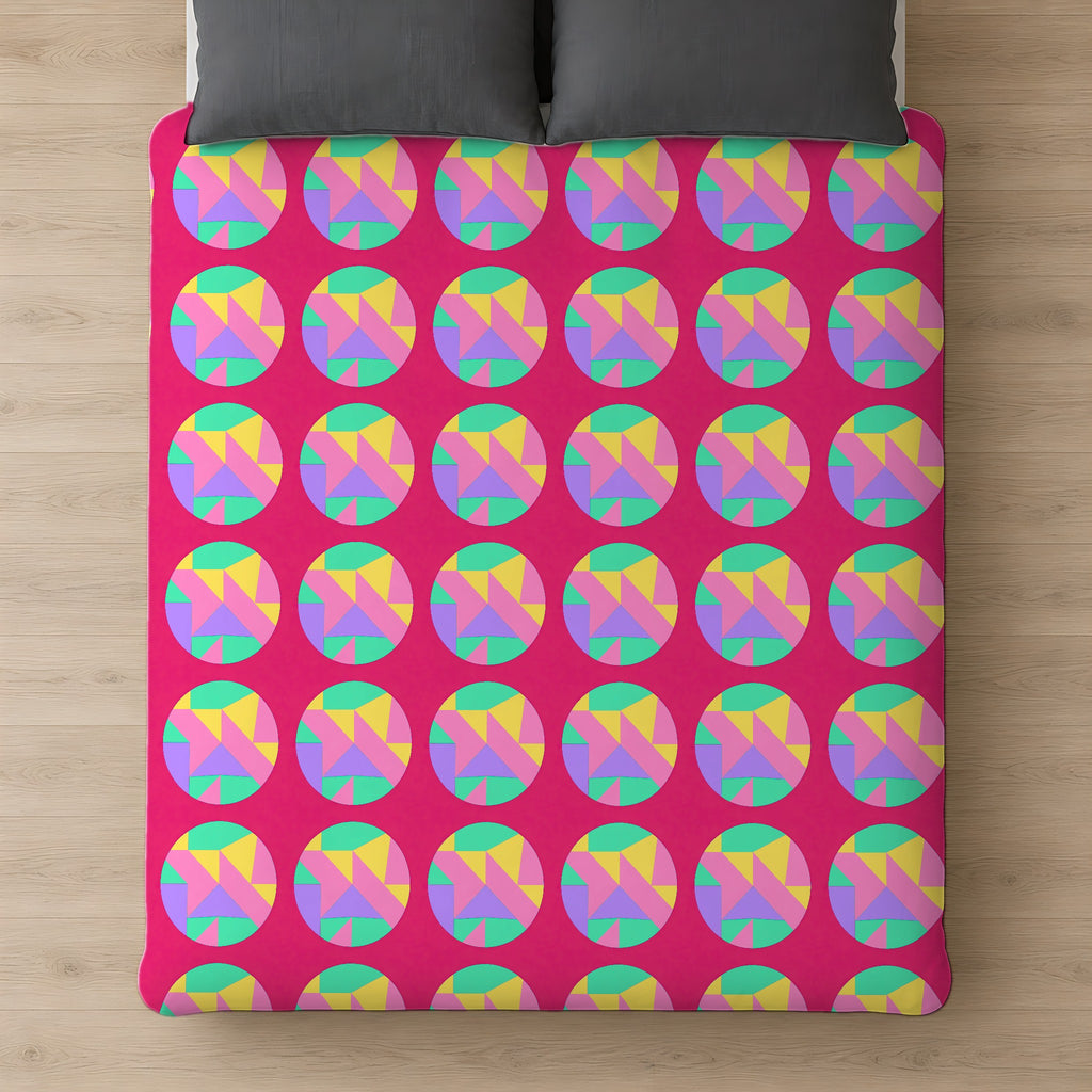 Broken Circle Planes Cotton Duvet Cover on a bed, seen from above
