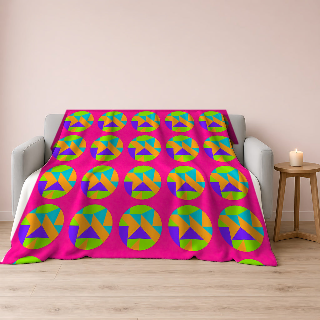 Broken Circle Planes Sherpa Fleece Blanket draped over a grey sofa