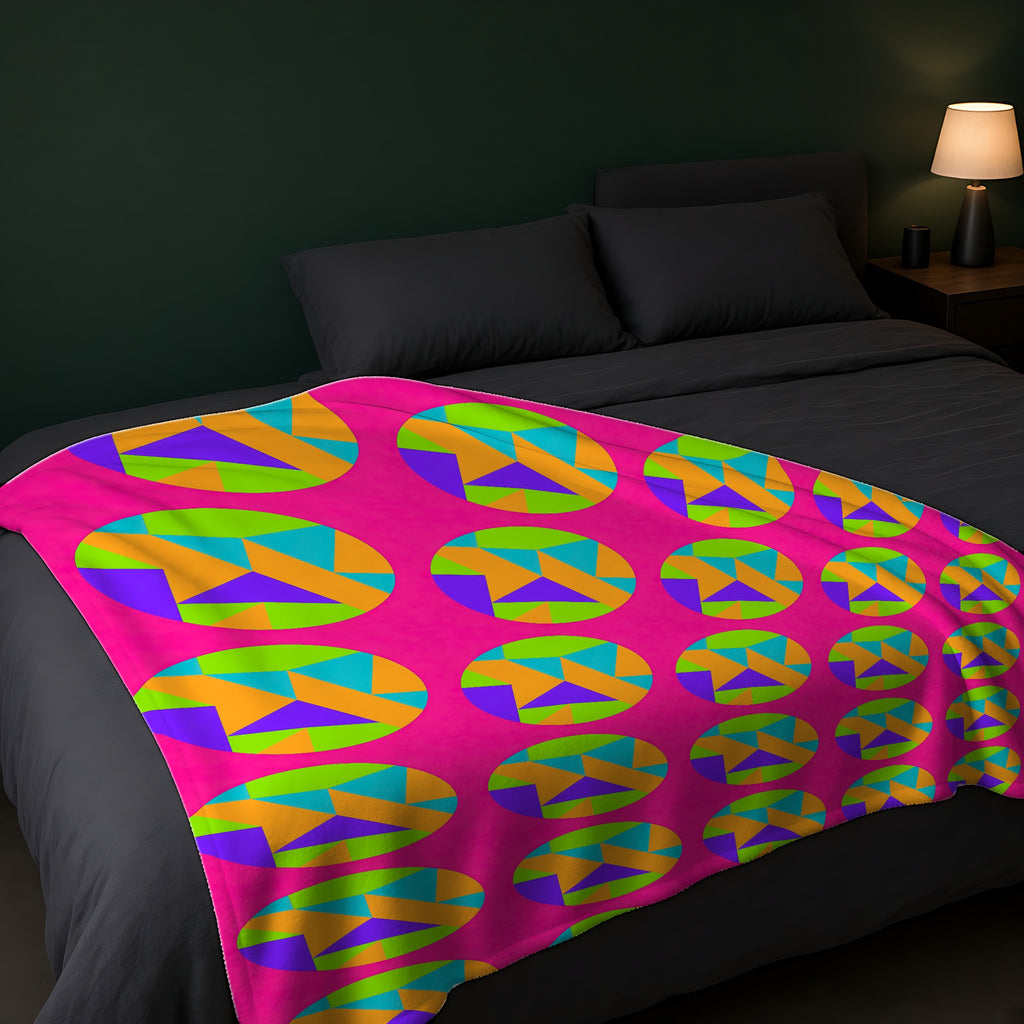 Broken Circle Planes Sherpa Fleece Blanket across the foot of a dark bed