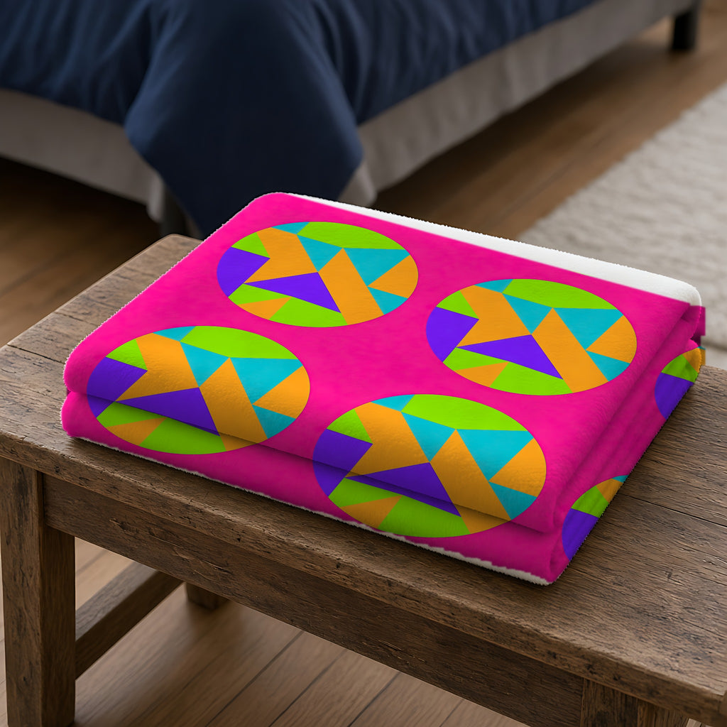 Broken Circle Planes Sherpa Fleece Blanket folded on a wooden bench