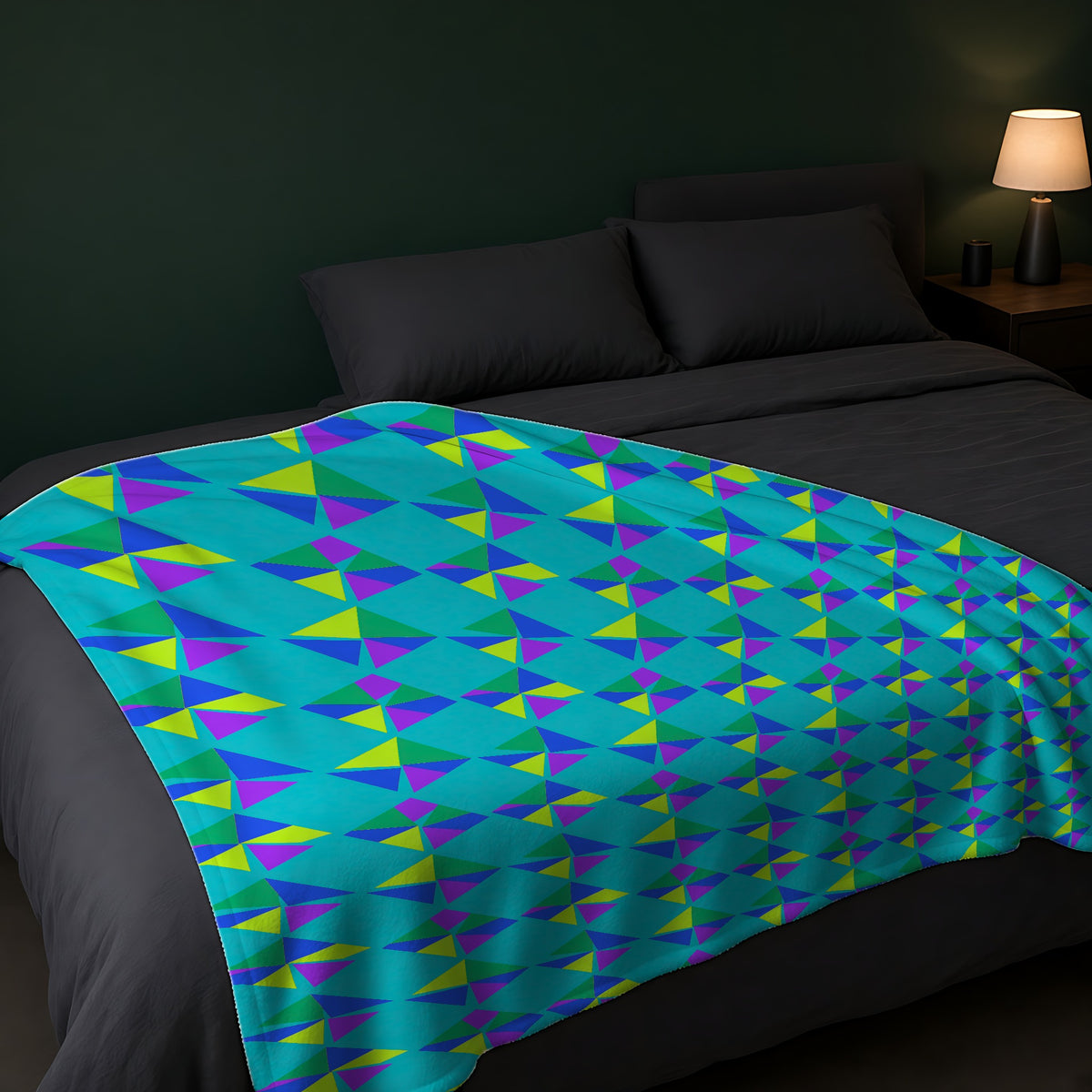 Stacked Cubist Prisms Sherpa Fleece Blanket across the foot of a dark bed
