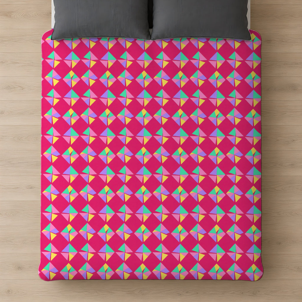 Stacked Cubist Prisms Comforter on a bed, seen from above