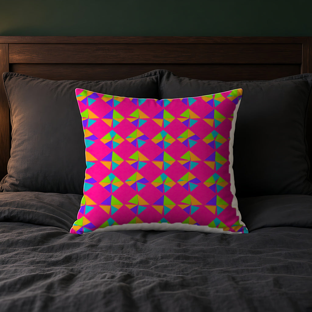 Stacked Cubist Prisms Faux Suede Cushion on a bed with charcoal bedding