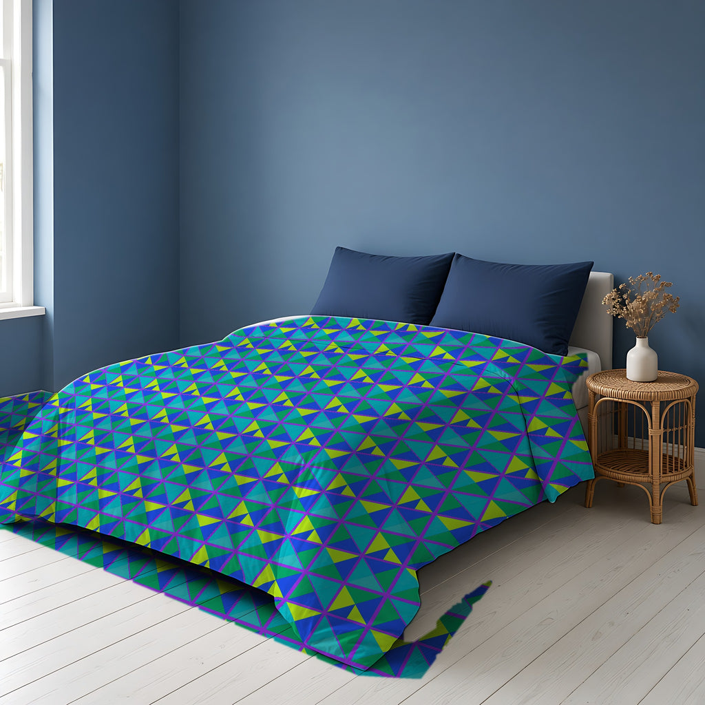 Split Square Fiesta Comforter on a bed in a Scandinavian blue bedroom