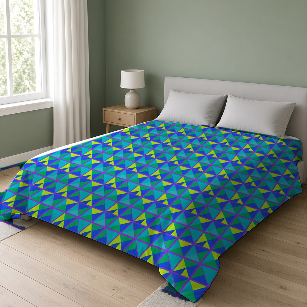 Split Square Fiesta Comforter on a double bed in a bright sage-green bedroom