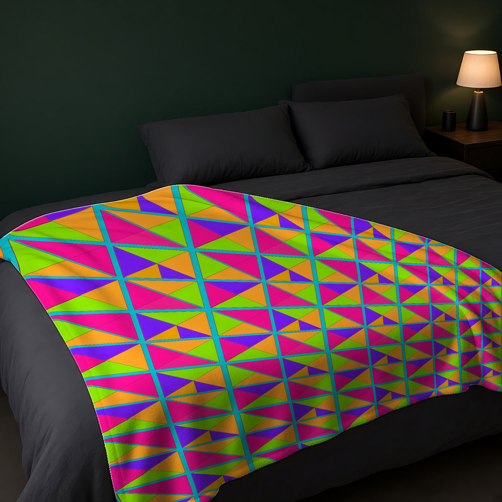 Split Square Fiesta Sherpa Fleece Blanket across the foot of a dark bed