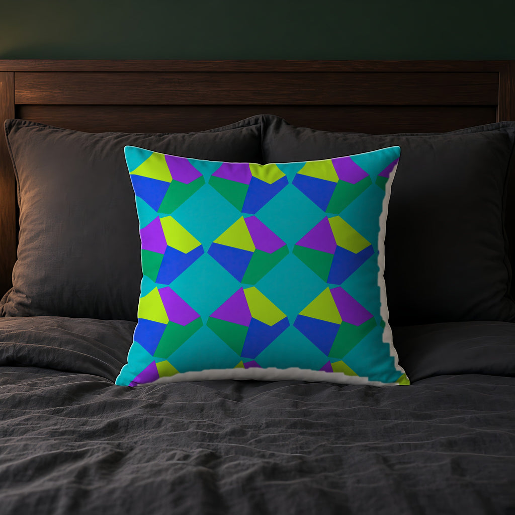 Grand Fractured Rhombus Faux Suede Cushion on a bed with charcoal bedding