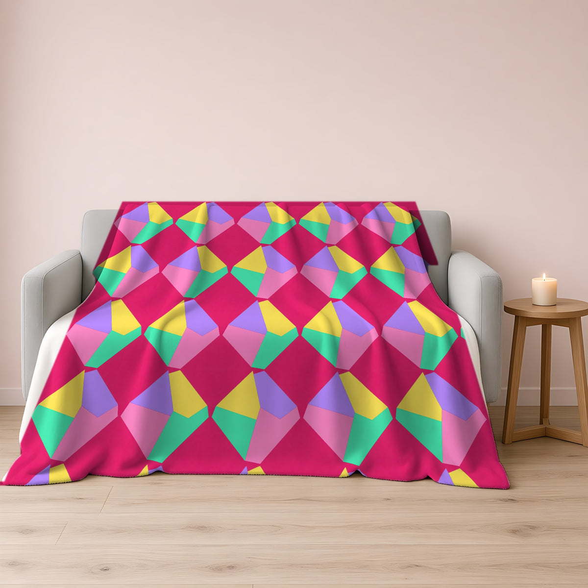 Grand Fractured Rhombus Sherpa Fleece Blanket draped over a grey sofa