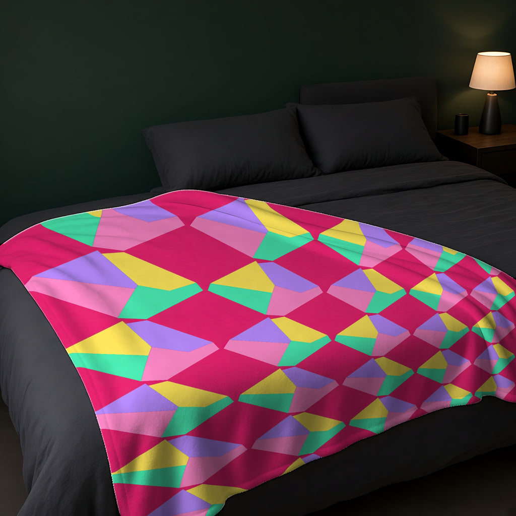 Grand Fractured Rhombus Sherpa Fleece Blanket across the foot of a dark bed
