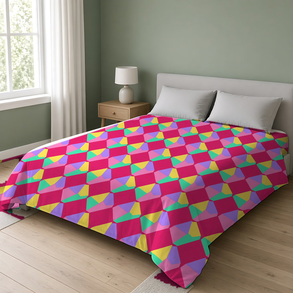 Grand Fractured Rhombus Comforter on a double bed in a bright sage-green bedroom