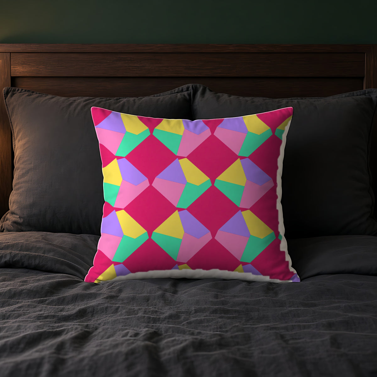 Grand Fractured Rhombus Faux Suede Cushion on a bed with charcoal bedding