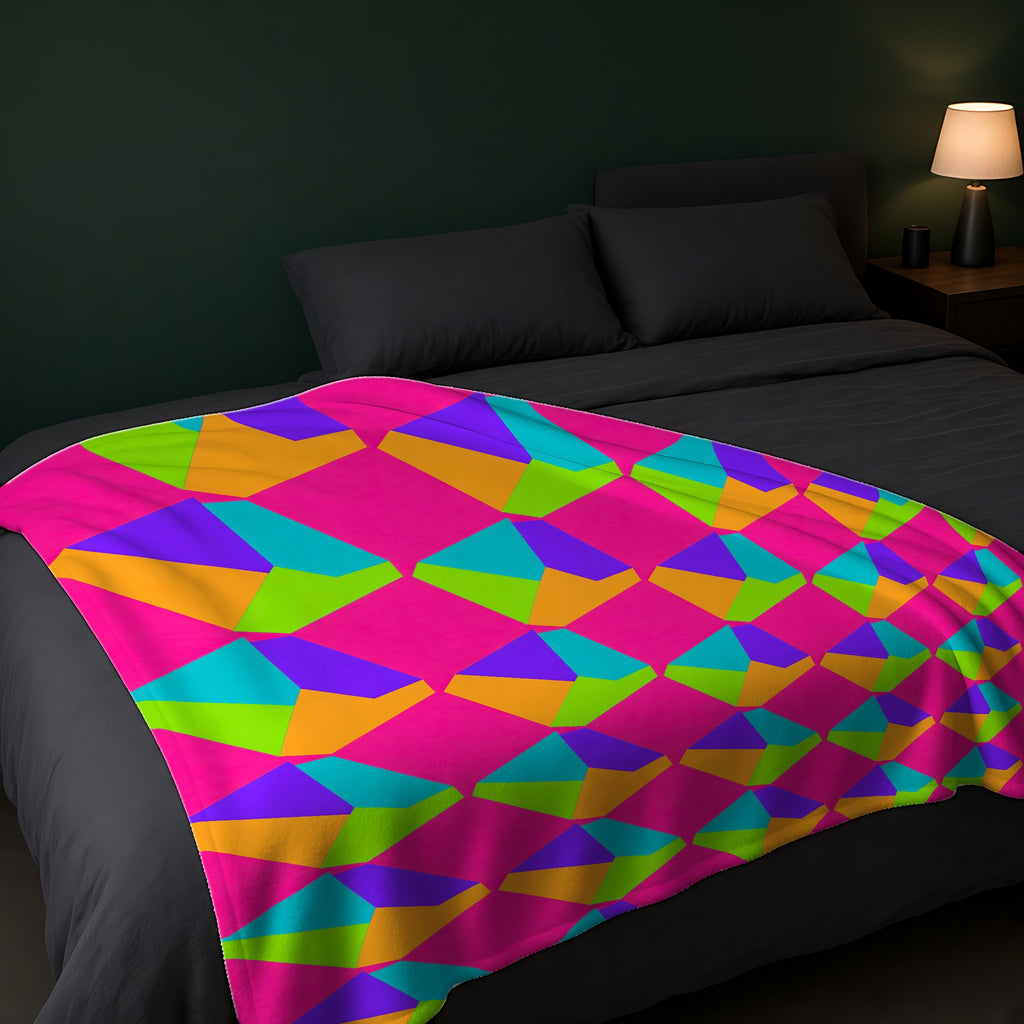 Grand Fractured Rhombus Sherpa Fleece Blanket across the foot of a dark bed