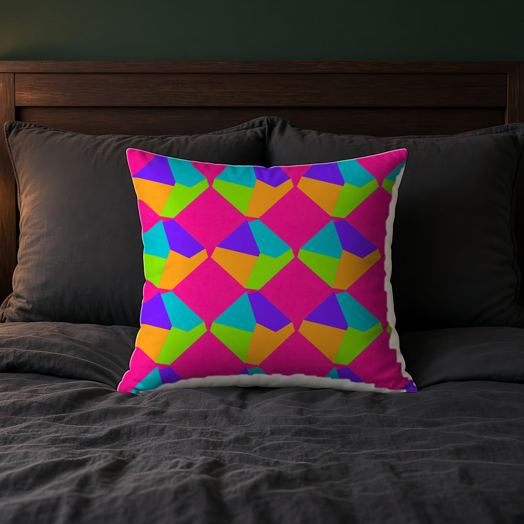 Grand Fractured Rhombus Faux Suede Cushion on a bed with charcoal bedding