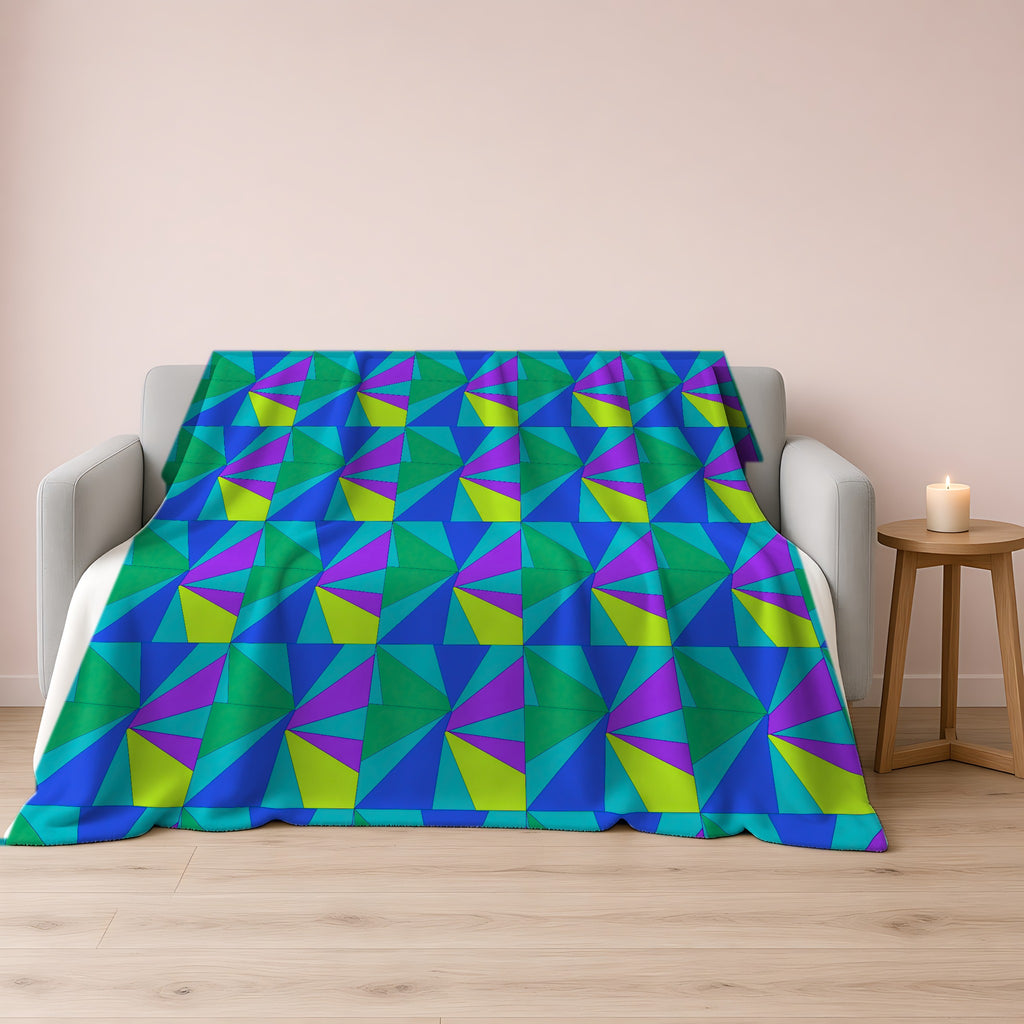 Cubist Sunburst Blocks Sherpa Fleece Blanket draped over a grey sofa