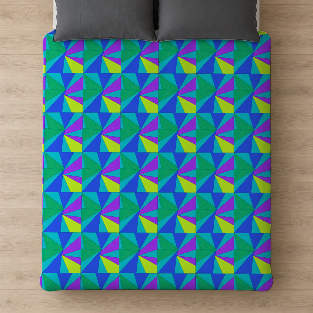 Cubist Sunburst Blocks Comforter on a bed, seen from above