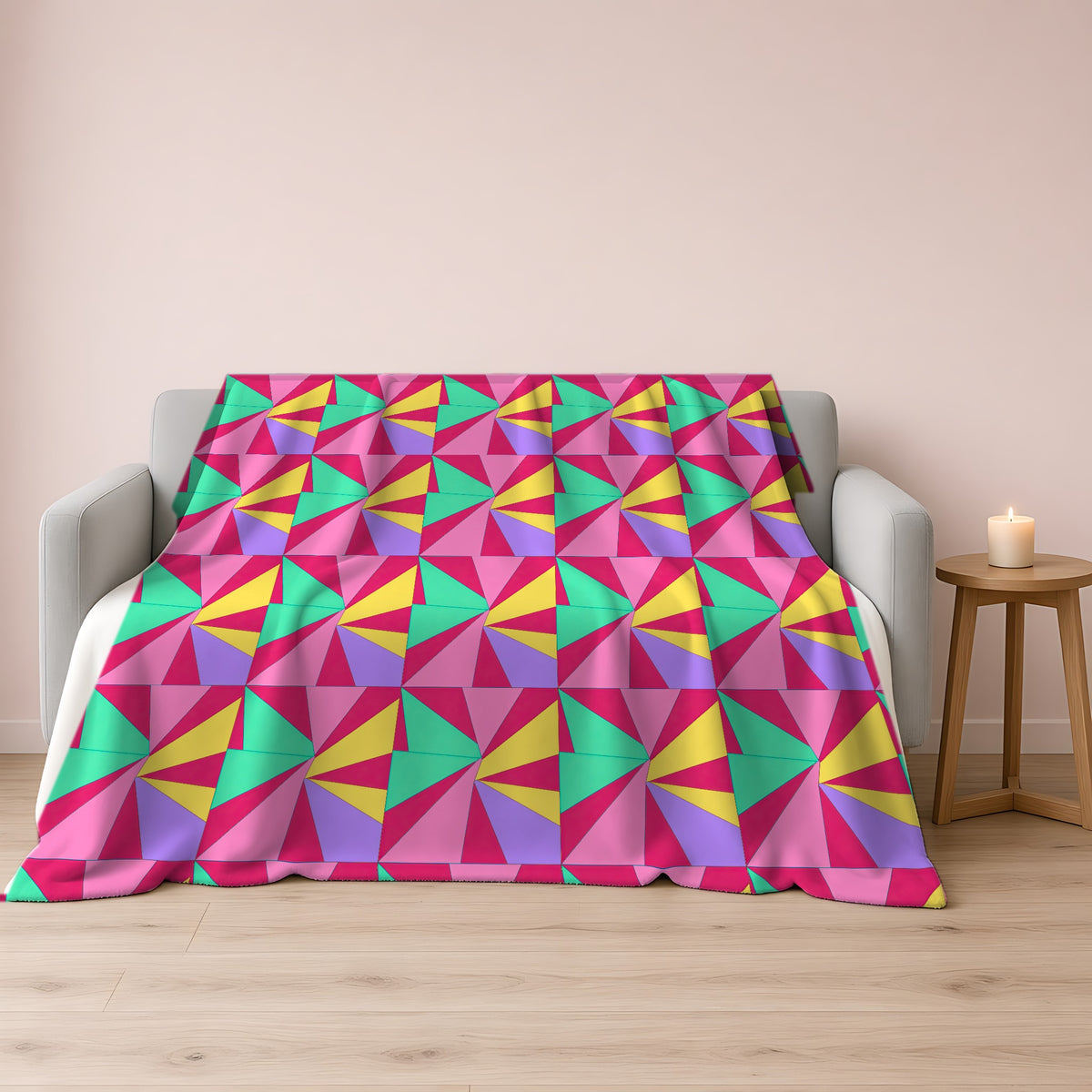 Cubist Sunburst Blocks Sherpa Fleece Blanket draped over a grey sofa