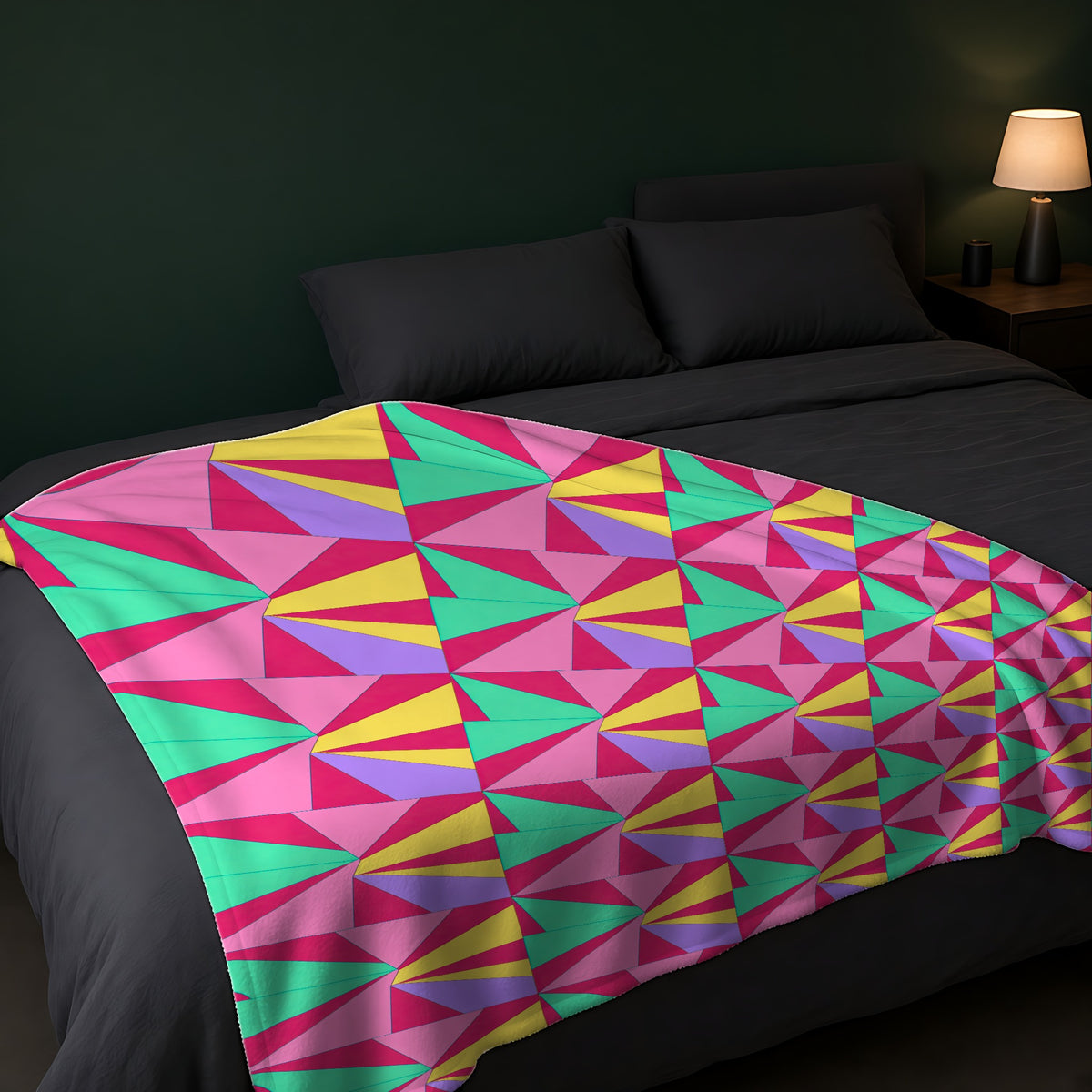 Cubist Sunburst Blocks Sherpa Fleece Blanket across the foot of a dark bed
