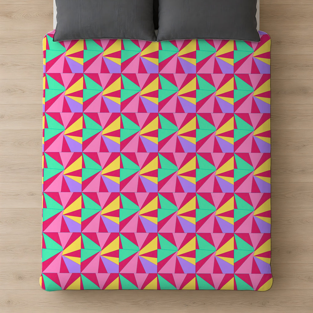 Cubist Sunburst Blocks Comforter on a bed, seen from above