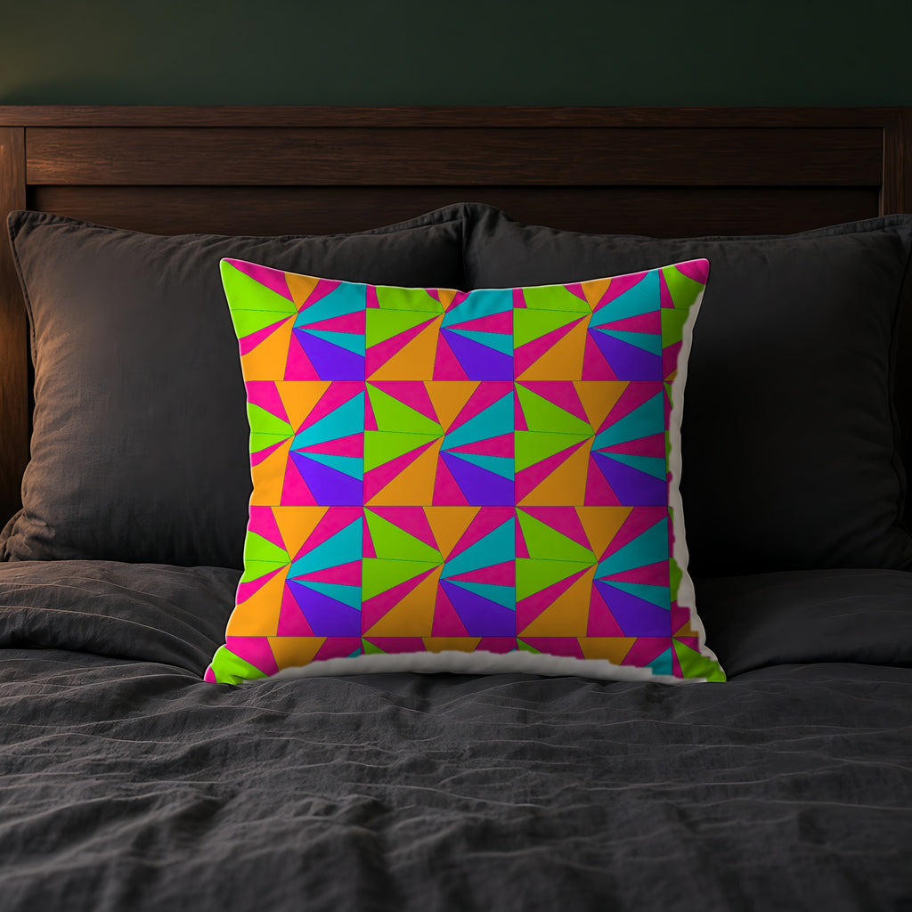 Cubist Sunburst Blocks Faux Suede Cushion on a bed with charcoal bedding